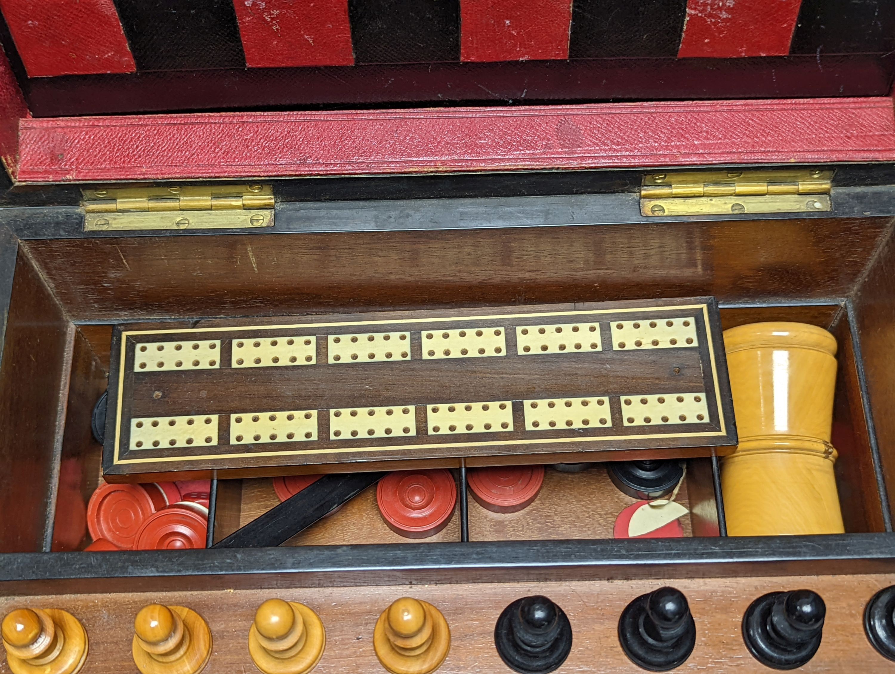 A Victorian burr walnut games compendium, 33cm wide